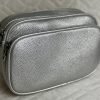 Női zippes kistáska ezüst